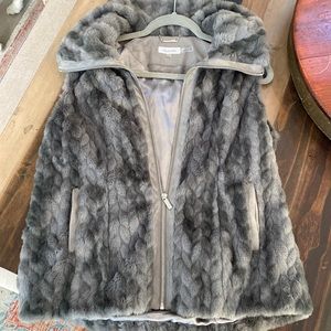 Calvin Kline faux fur vest.  New without takes.  So So soft feels like real fur.